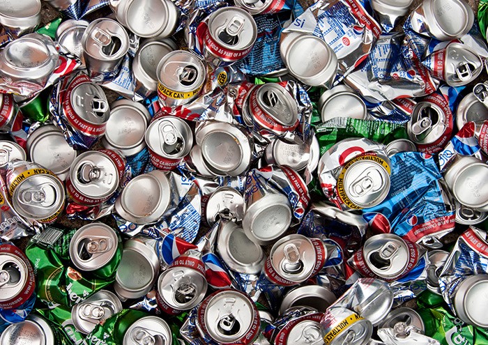 Scout Troop 35 members install new recycling bin to collect aluminium cans