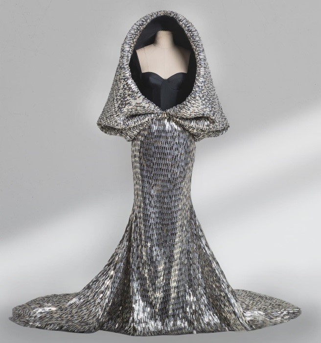Former Miss World graces the French Riviera in a Sophie Couture aluminium gown