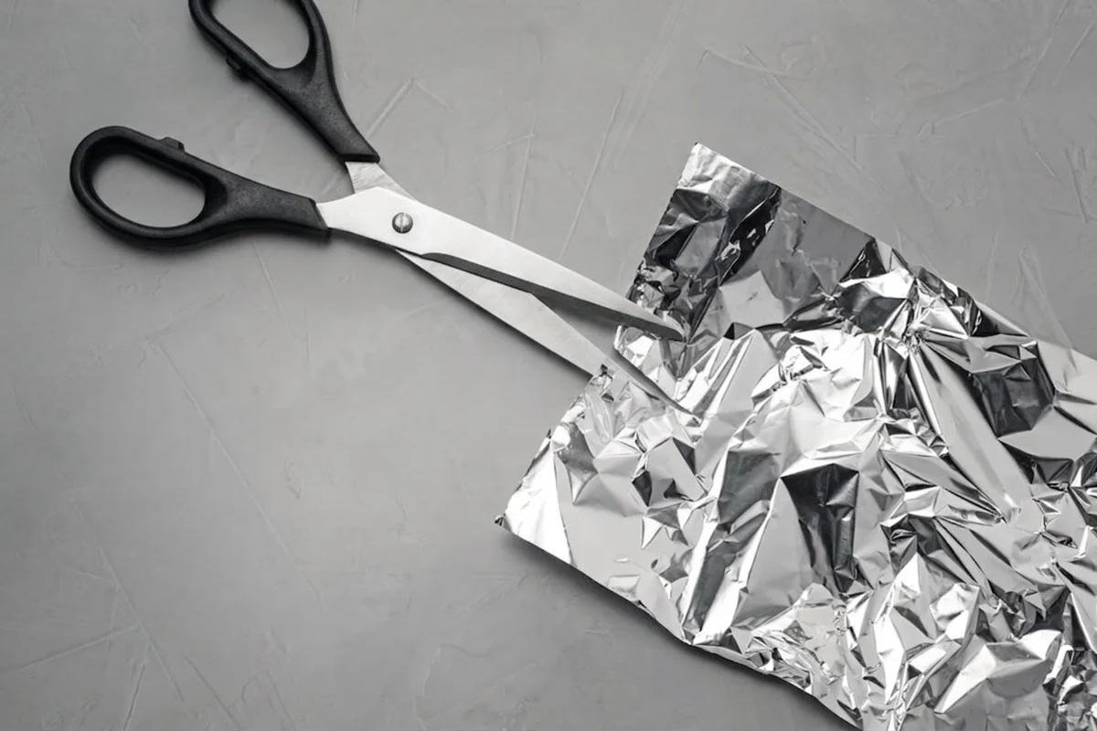 Dull blades and aluminium foils: What a 0.23 friction coefficient means for cutting performance