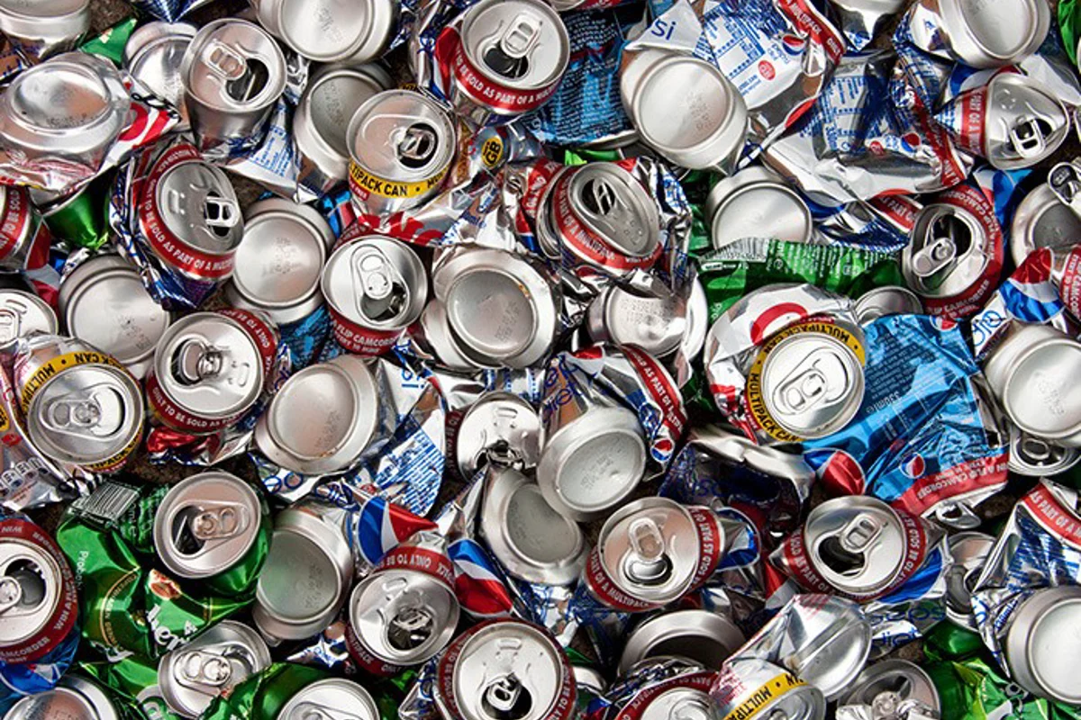 Scout Troop 35 members install new recycling bin to collect aluminium cans