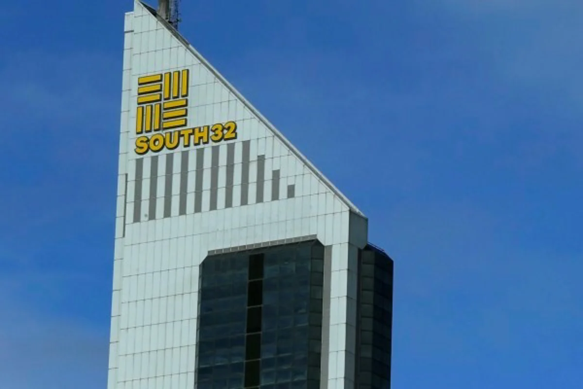 South32 marks US$100 million capital build for clogged ports halting aluminium shipments