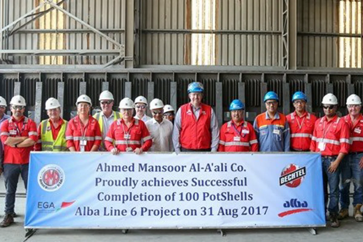 Alba CEO Tim Murray celebrates 100 pot shell fabrication of Alba Line 6 expansion project at AMA Group